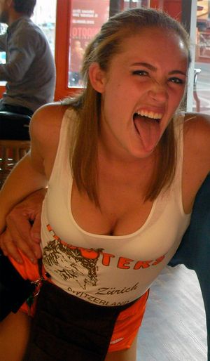 Swiss Hooters girl with her tongue out