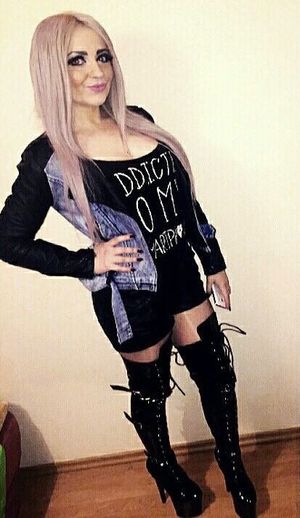 Hot blonde in shiny outfit