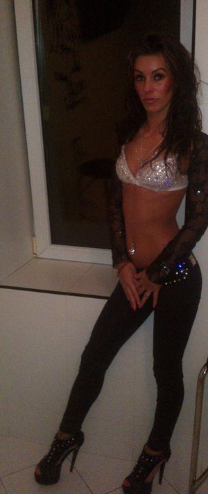 Horny brunette before going out.