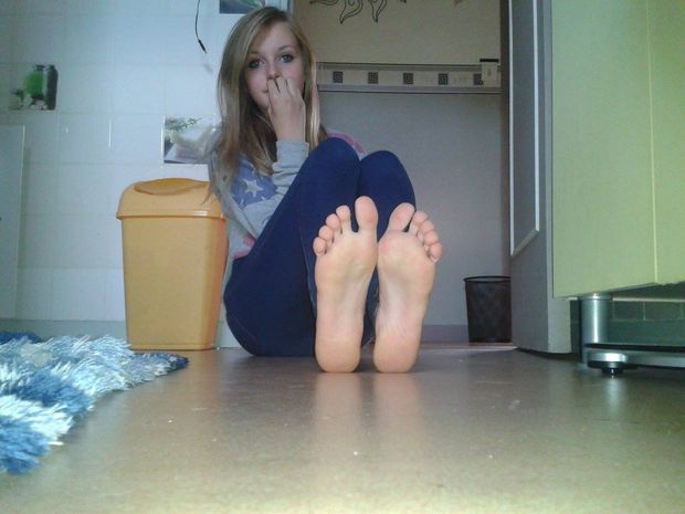 Showing off her feet.