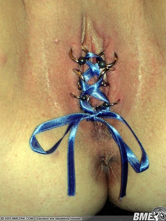 pussy with a blue band over it