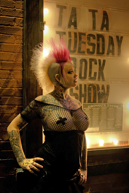 Rachael Reckless is thoroughly modest tonight, wearing both nipple tape AND fishnet over her boobs
