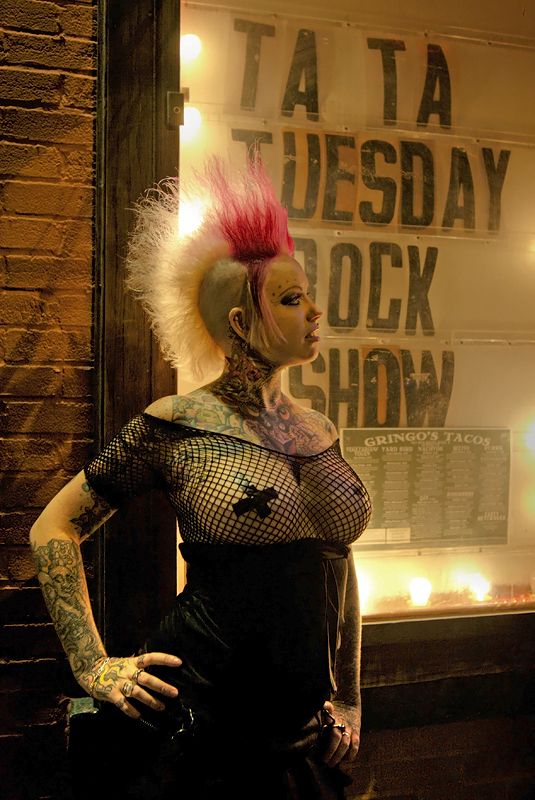 Rachael Reckless is thoroughly modest tonight, wearing both nipple tape AND fishnet over her boobs