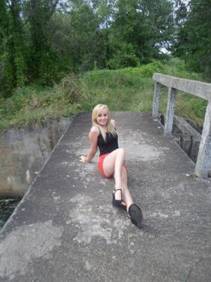 Young blonde chick posing outdoor, before her first fuck in public