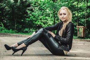 Tight leather leggings, black jacket and sheer top on a youg horny body of cute blonde rookie