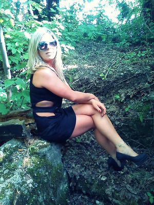 Dogging, hot blonde chick waiting for some horny guys nearby busy street