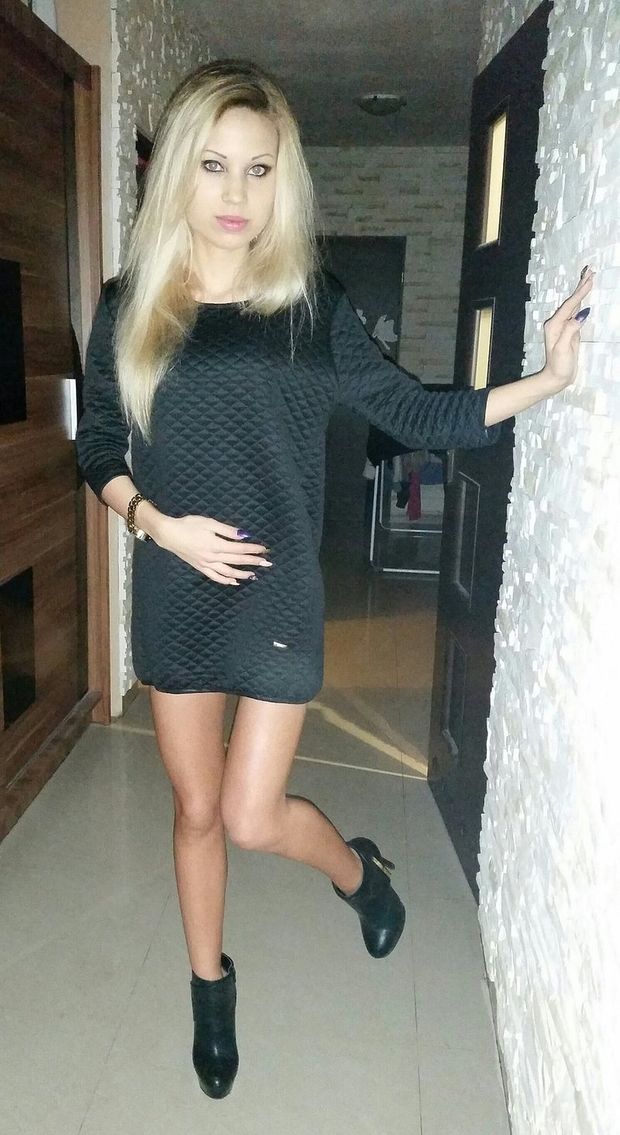 Blonde chick going out in a short dress