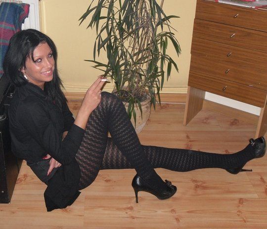 Black hair bimbo hits the floor, first smoke cigarette then will smoke some cocks