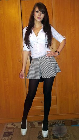 Slutty student before going out, she looks more like schoolgirl from cheap porn.