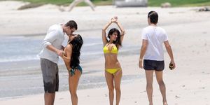 KIM KARDASHIAN HAS A SEXY PHOTO SHOOT IN A BRA ON THE BEACH - VISIT OUR WEBSITE