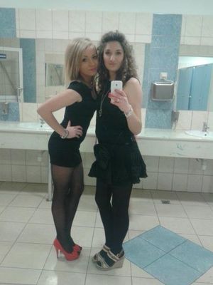 Horny chicks in a restroom