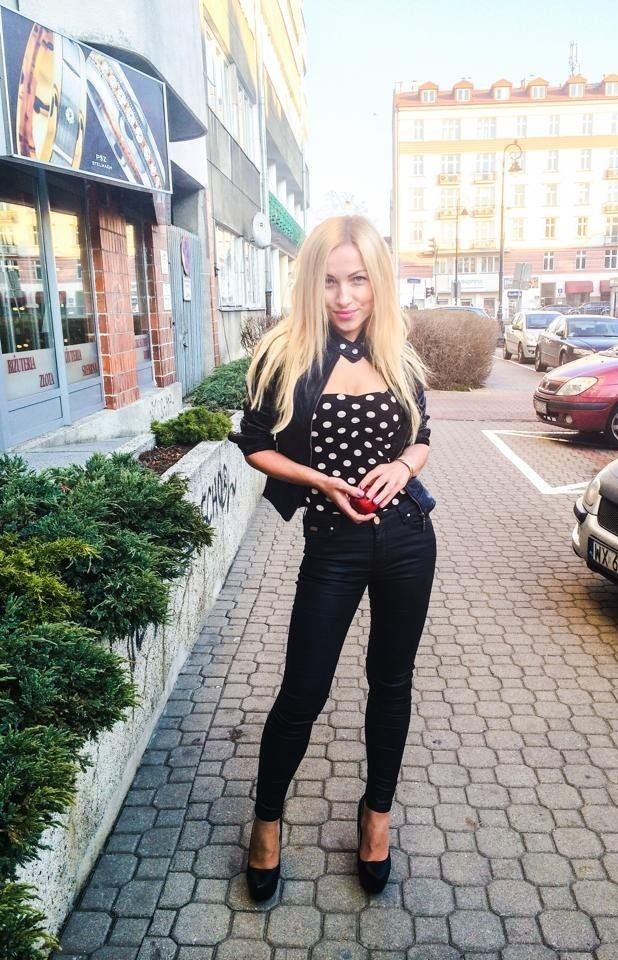 Leggy blonde walking street