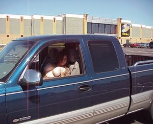 Big tit chick in a truck waiting in parking lot