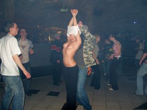 Boyfriend gets her topless at the club.