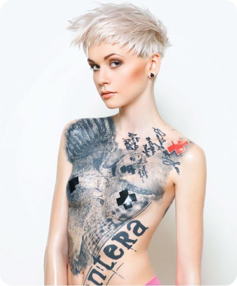 Inked tattoo blonde with amazing ink on body cover her boobs
