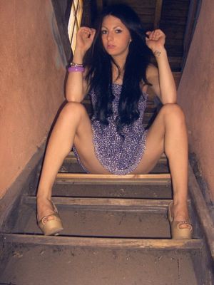 Horny rookie sitting in a staircase