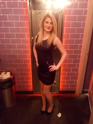 Kinky blonde before her first visit at the nightclub gloryhole