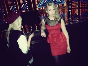 Blonde chick in red dress on a party