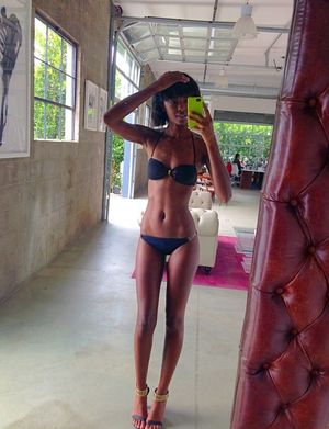 very nice abony girl with extremely long seductive legs takes Selfi and shows flat belly and hard small boobs...take pleasure in