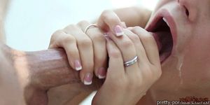 Stroking him with both of her hands to make him cum in her mouth