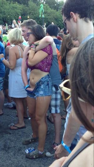 Fingering chick at concert