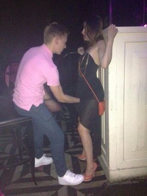 Plays with her pussy at night club