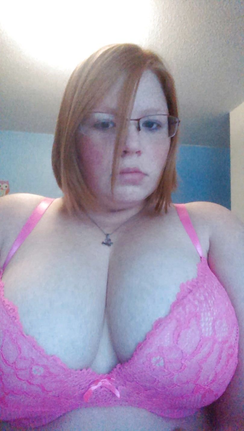 redhead with big breasts takes selfie