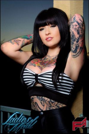 Curvy babe tattoo in black costume very sexy girl love it