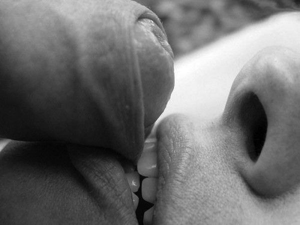 Nibbling on his foreskin