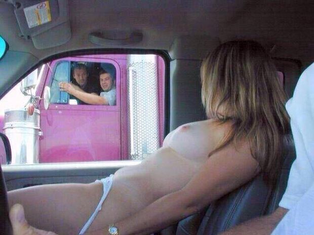 Girl flashes for truck driver