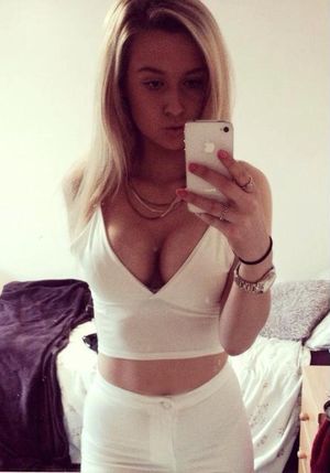 Blonde girl in white