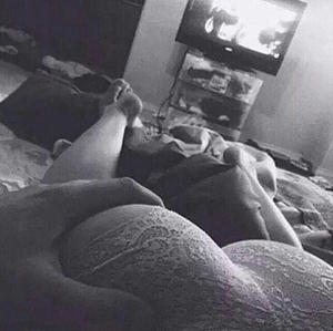 Laying on each other, and grabbing her ass and the cute cotton that covers it