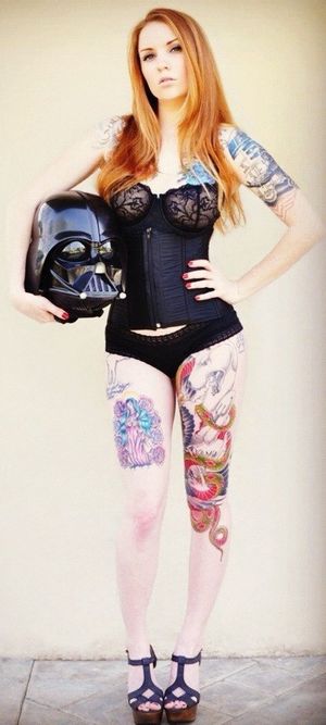 Yummy girl with Star Wars tattoos.