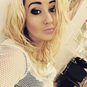 Blonde bimbo dolled up