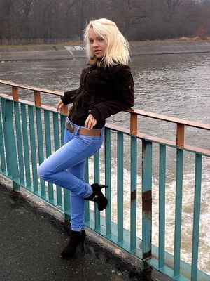 Sexy blonde on the bridge