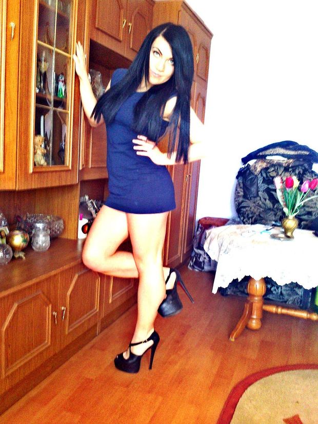 Dark hair bimbo before going out