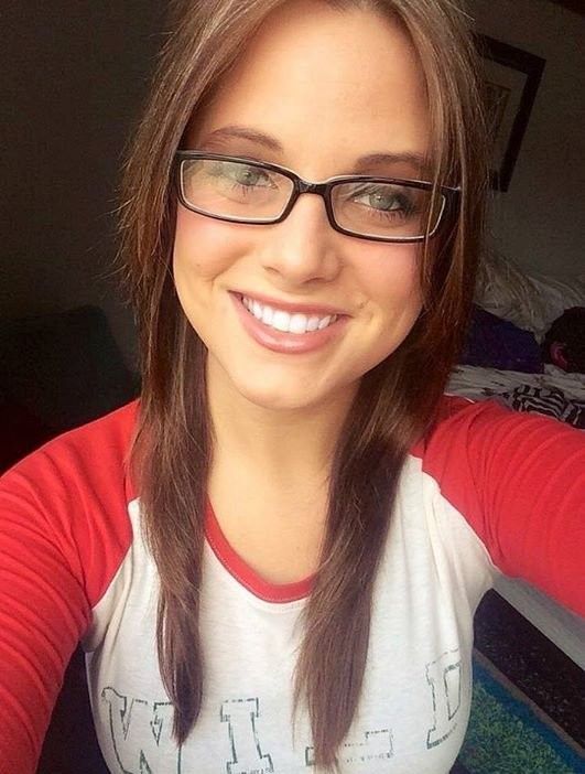 Wild teen in glasses smiling