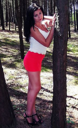 Sexy brunette in the woods