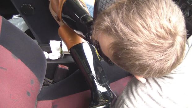 Cleaning Boots in Car
