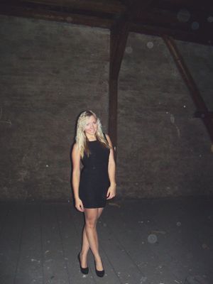 Hot blonde in tight dress in the attic