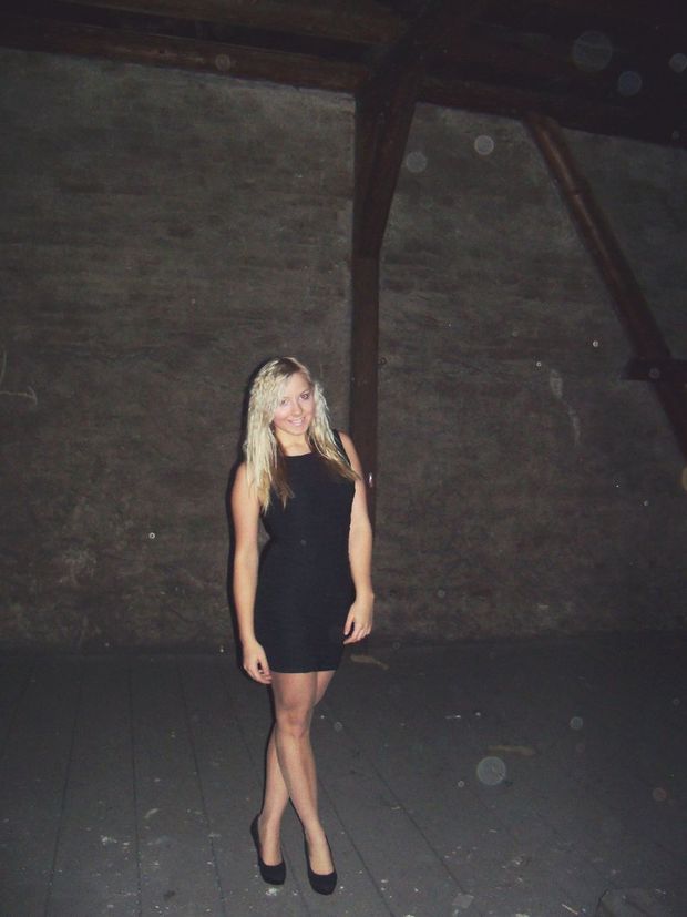 Hot blonde in tight dress in the attic
