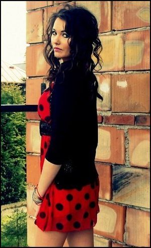 Sexy brunette in pinup style outfit