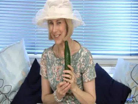 Mature housewife fucks a cucumber