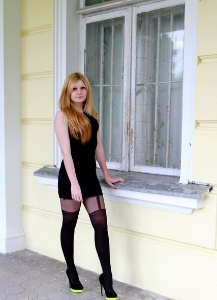 Hot redhead outdoor in tight dress