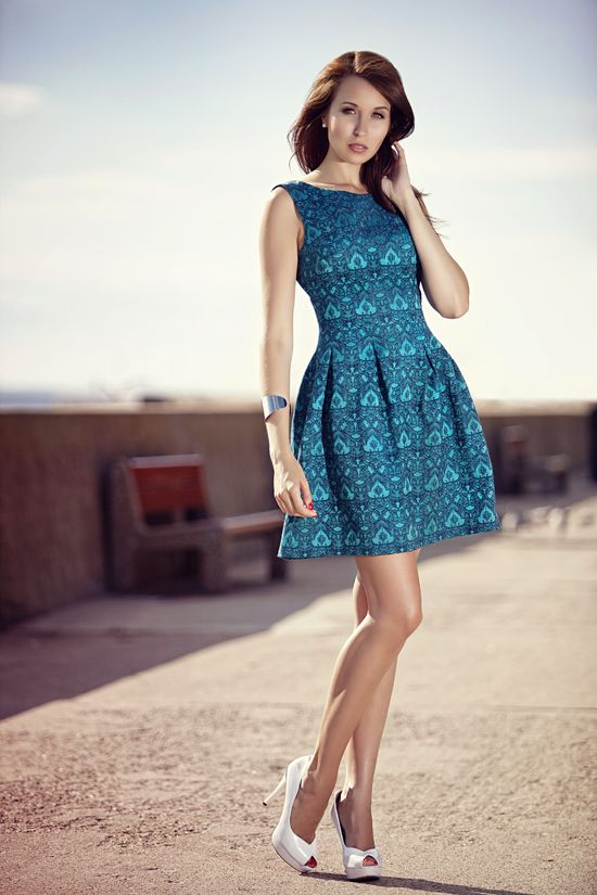 Beautiful redhead model posing outdoor