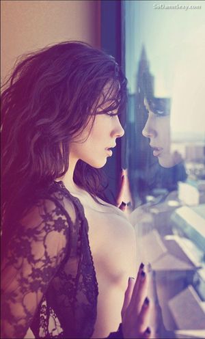 Stunning brunette babe with a view