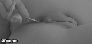 Pulling anal beads from her ass