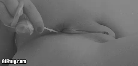 Pulling anal beads from her ass