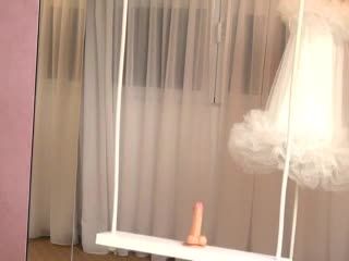 Rosemarie blonde beauty playing and riding toy on swing