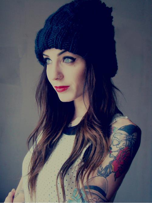 A beanie and a sleeveless shirt. Does it make sense? Nope. But don't ask questions, just enjoy.